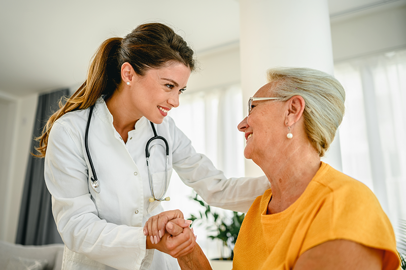 Healthcare professional tending to patient